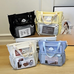 Lightweight large capacity tote bags in four pastel colors with clear PVC card slots