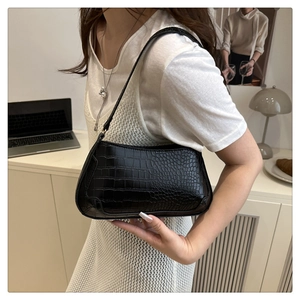 French retro black crocodile pattern baguette shoulder bag styled with a chic summer outfit