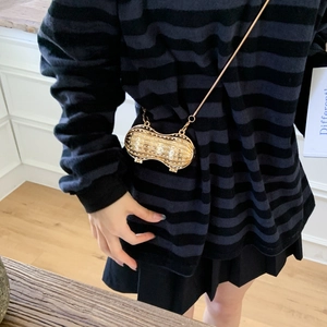 Golden peanut-shaped mini crossbody bag with rhinestones and metal chain strap
