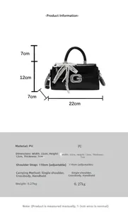 Detailed size specifications of black handbag with pearl bow and metal logo detail