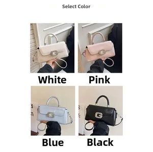 Detailed view of luxury leather bags with diamond G-logo buckle and metal handles