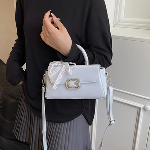 Chic light blue patent leather small handbag with pearl lace bow and metal G buckle