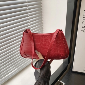 Elegant red crocodile pattern baguette bag with stylish shoulder strap for women