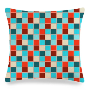 Vue détaillée du motif en mosaïque colorée sur un coussin décoratif carré en lin