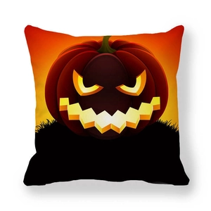 Dettaglio federa in lino per Halloween con vivace design a forma di zucca Jack-o-lantern