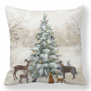 Detail of Christmas pillowcase featuring a festive tree and forest animals illustration