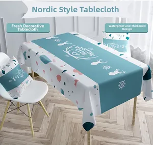 Dettaglio della tovaglia nordica impermeabile e dei cuscini con tema nautico blu e bianco