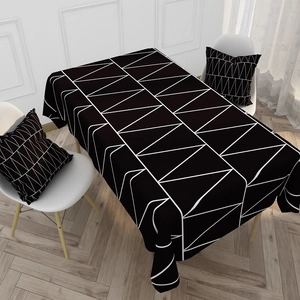 Waterproof cotton linen tablecloth with black and white geometric pattern and cushions