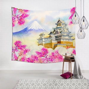 Japanese style tapestry with Mount Fuji and cherry blossoms on a white brick wall