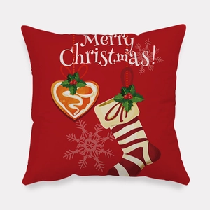 Detail of red square Christmas pillowcase with Merry Christmas print and festive icons