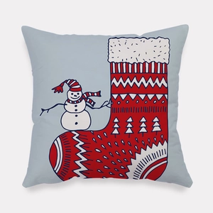 Detail of Christmas pillowcase with a cute snowman standing on a festive red holiday stocking