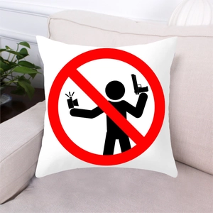 Macro detail of anti-gun peach skin throw pillow on a grey sofa with green plant decor