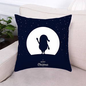 Fodera per cuscino natalizio blu navy con silhouette di Babbo Natale su divano