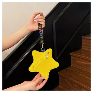 Star-shaped yellow coin purse with embroidered LOVE wrist strap and heart zipper
