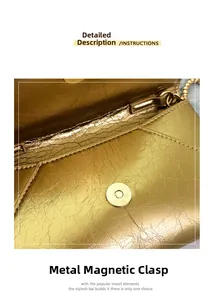 Detail of the golden metallic textured leather bag featuring a secure magnetic clasp