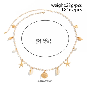 Detail of starfish and shell charms on a layered pearl body chain with size measurements