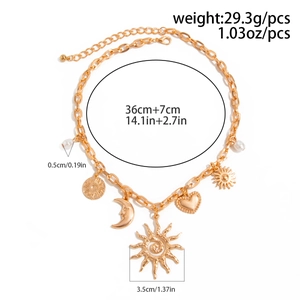 Detailed view of bohemian gold sun pendant with measurements and paperclip chain