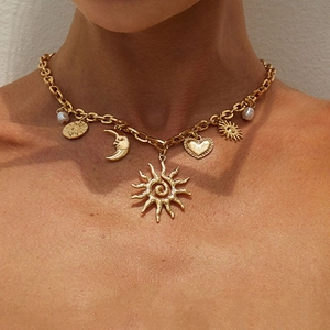 Vintage gold chunky chain necklace with embossed sun moon pendants and pearls for women