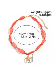 Dettaglio della collana in organza arancione con ciondolo a stella marina e misure