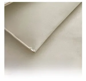 Detail showing precise stitching and leather texture of white crossbody handbag