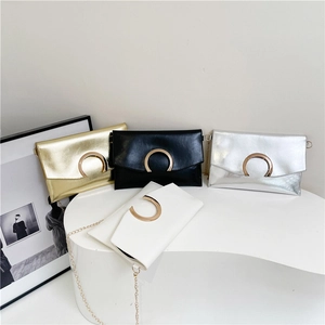 Fashionable envelope clutch bags in gold, black, silver, and white with chain straps