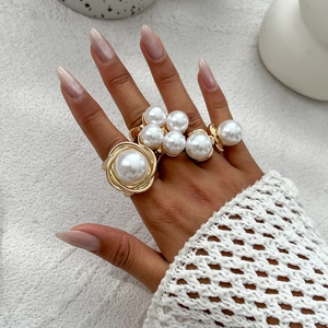 Chic gold-toned pearl ring set for women featuring vintage metal button stackable designs