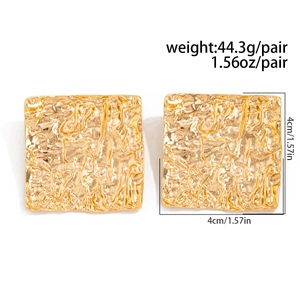 Detail view of 4cm gold square earrings showing textured hammer finish and dimensions