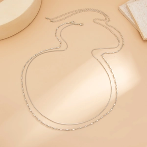 Detail of silver double-layered snake waist chain with lobster clasp and extension