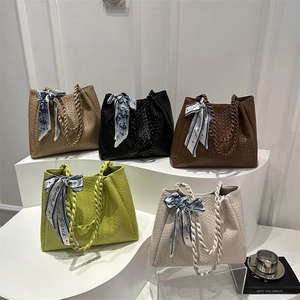 Woven tote bags with silk scarves in khaki, black, brown, lime green, and milk white