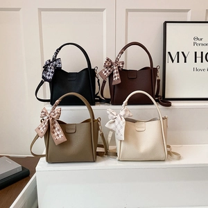 Minimalist bucket bag in four colors with lychee texture and decorative silk scarves
