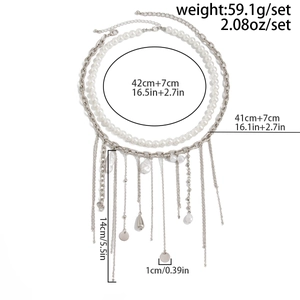 Detailed view of layered necklace set with pearls and pendants including measurements