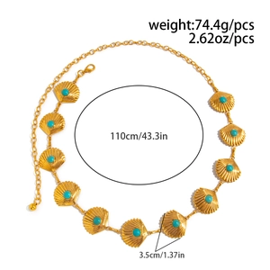 Detail view of beach waist chain with gold scallop shells and turquoise beads decoration