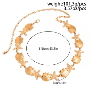 Detailed view of gold alloy body chain with starfish, seashells, and white faux pearls