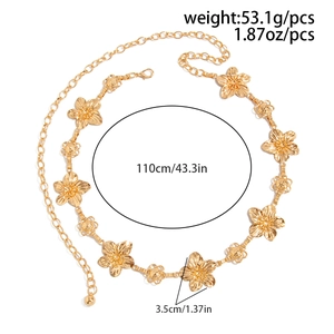 Detail view of gold metal waist chain with 3.5cm 3D flower charms and adjustable length