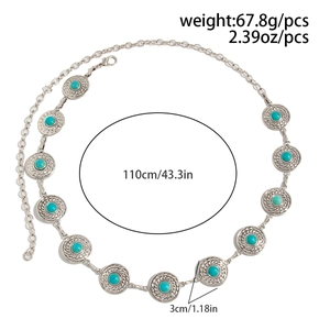 Detail view of bohemian silver metal waist chain with turquoise stones and size markings