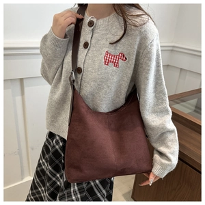 Large dark brown suede tote bag with leather shoulder strap for autumn winter fashion