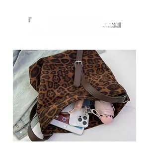 Interior view of leopard print tote bag showing large capacity for iPad and essentials