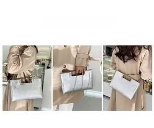 Silver crocodile texture handbag with chain strap shown in various wearing styles