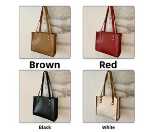 Detail view of four tote bags in brown, red, black, and white with crocodile texture