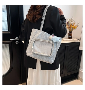 Fashionable light blue pleated nylon tote bag with mesh pocket and star pendant charm