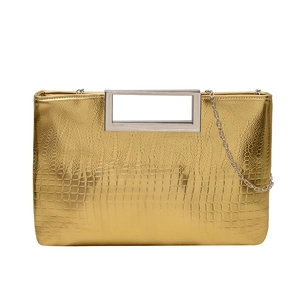 Chic gold crocodile texture crossbody bag with metallic silver handle and chain strap