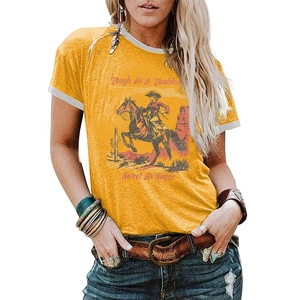 Detail of yellow T-shirt with contrast white trim and vintage western cowgirl print