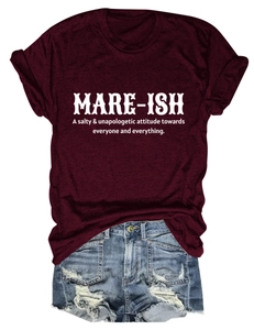 Flat lay of a burgundy Mare-ish letter print T-shirt with distressed blue denim shorts