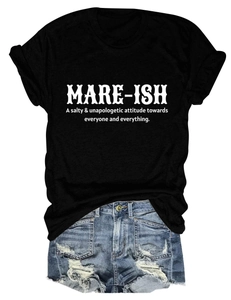 Detailed flat lay of black cotton T-shirt with white slogan and frayed denim shorts