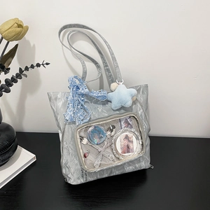 Silver-grey crinkled tote bag with transparent window display for anime accessories