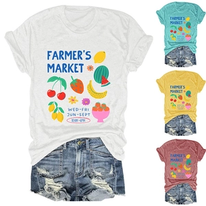 Detail showing colorful Farmers Market fruit illustrations on cotton crewneck t-shirts
