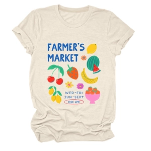 Detail of colorful fruit print and Farmer's Market text on cream casual short sleeve t-shirt