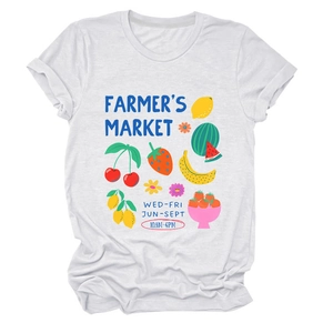 Detail view of the colorful fruit print on white cotton T-shirt for farmers market