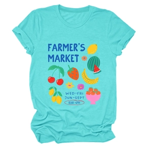 Detail of teal t-shirt with vibrant fruit illustrations and Farmer's Market typography
