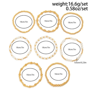 Detail of 8-piece gold bead and faux pearl bracelet set with precise size measurements